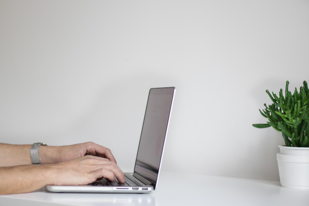 person using laptop online course