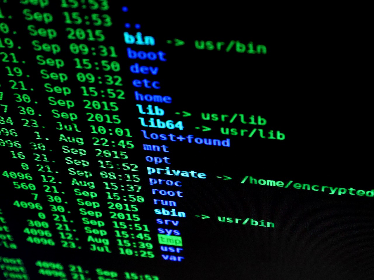 person typing on encrypted email laptop